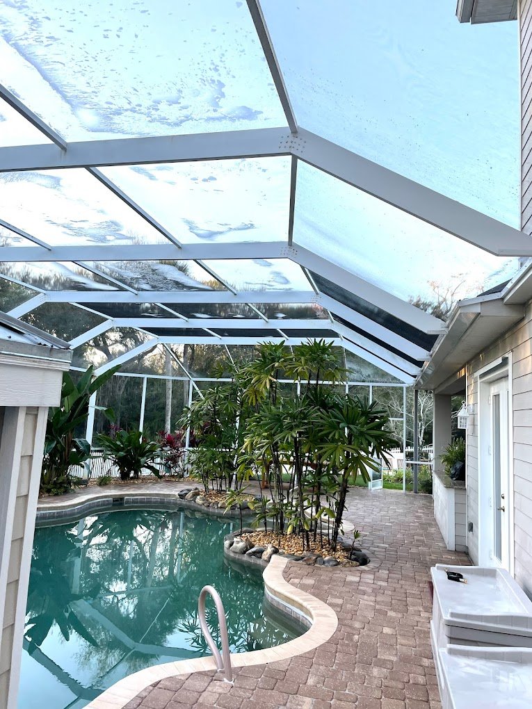 Clean pool enclosure and screen after professional pool enclosure cleaning in Brevard and Volusia County by Suncoast Softwash.