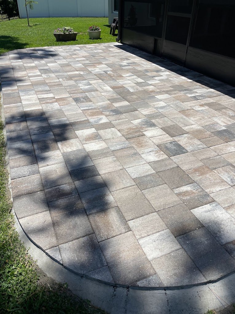 Freshly sealed patio pavers in Brevard County showing renewed color and protection after professional paver sealing by Suncoast Softwash.