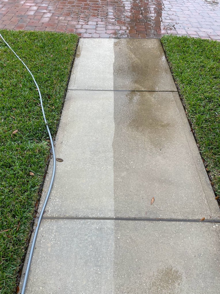 Before and after of sidewalk cleaning in Brevard and Volusia County by Suncoast Softwash showing removal of dirt and stains.