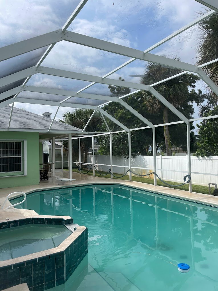 Clean pool enclosure and screens after professional pool enclosure cleaning in Brevard and Volusia County by Suncoast Softwash.