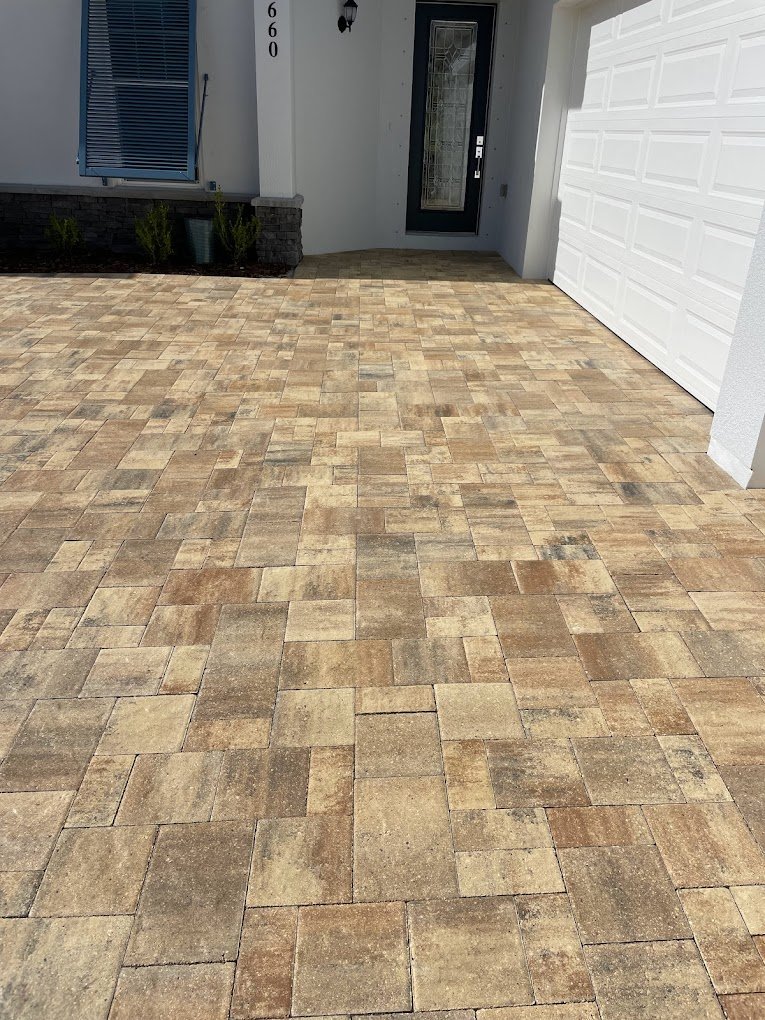 Sealed paver driveway in Brevard County after professional paver sealing by Suncoast Softwash, showcasing restored color and long-lasting protection.