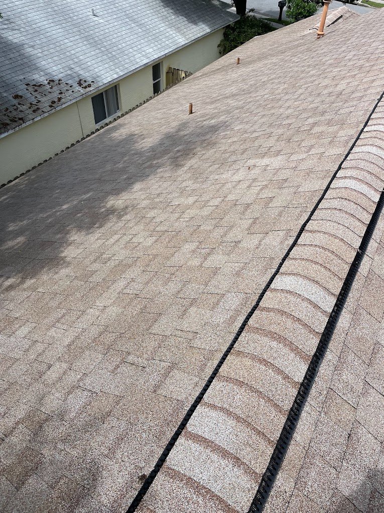 Roof cleaning in Brevard and Volusia County showing a freshly cleaned asphalt shingle roof.