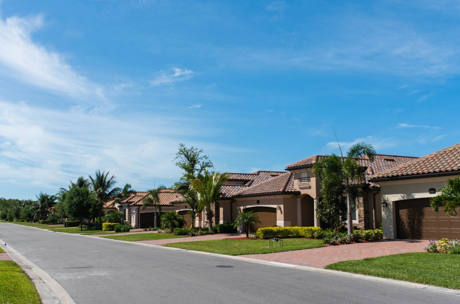 wondering when is the best time of year to wash your house in florida? image showing HOA residential community with an overhead camera. Photo by FilterGrade on Unsplash